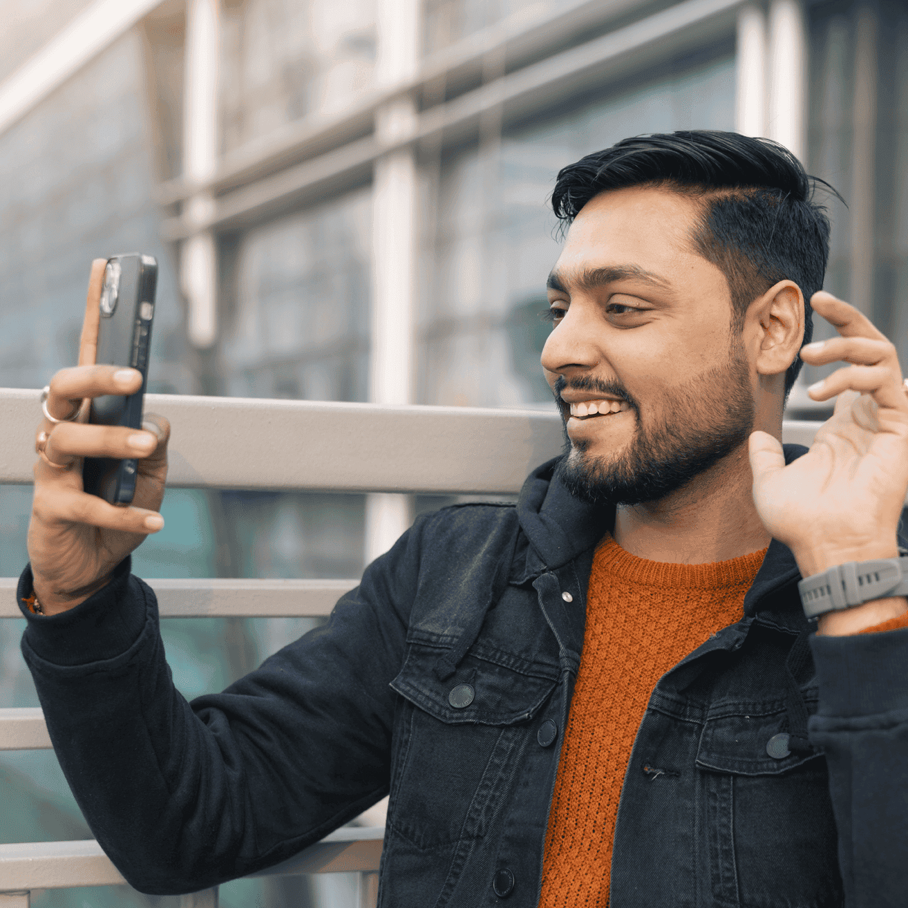 man looking at phone