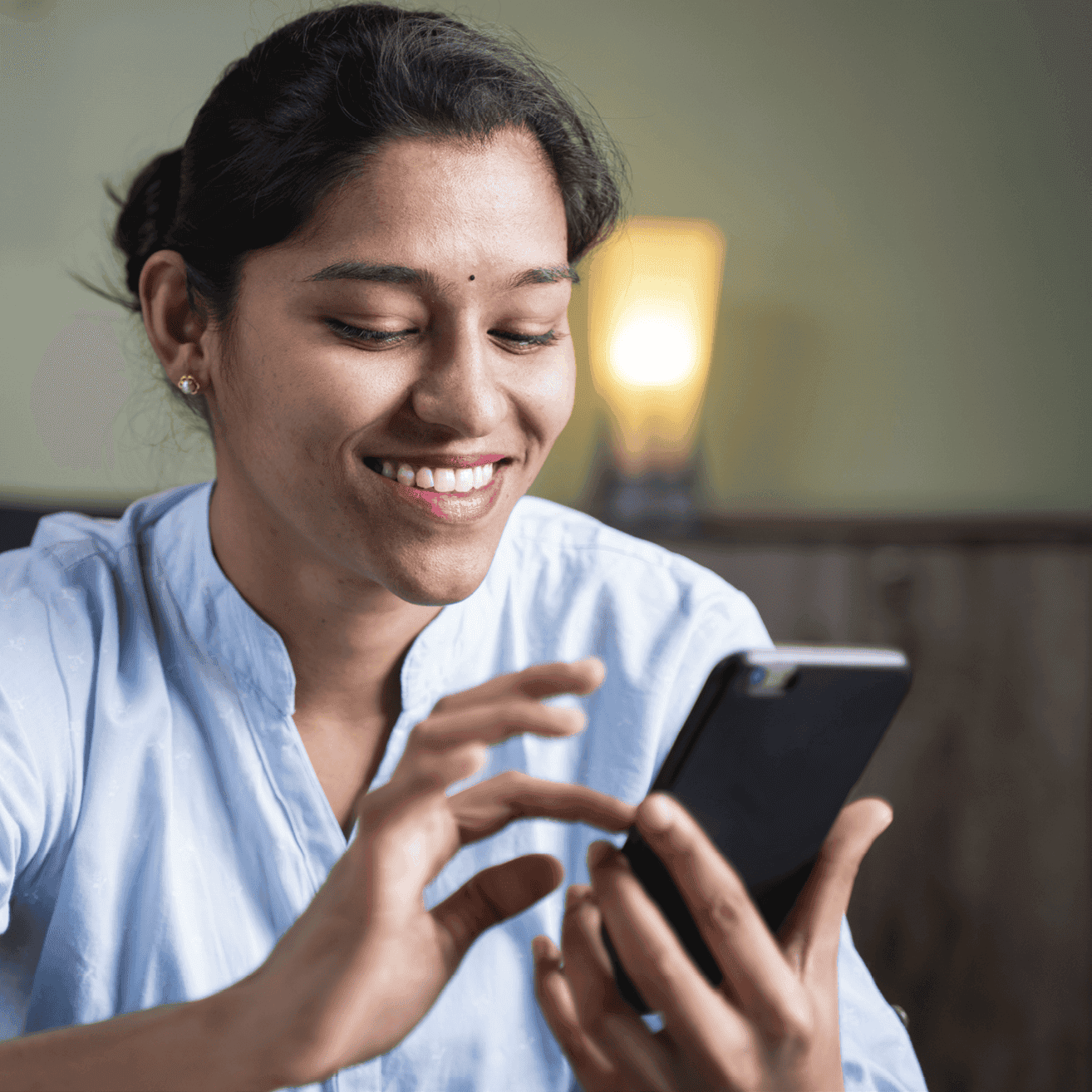 Smiling woman with phone for marketing mix