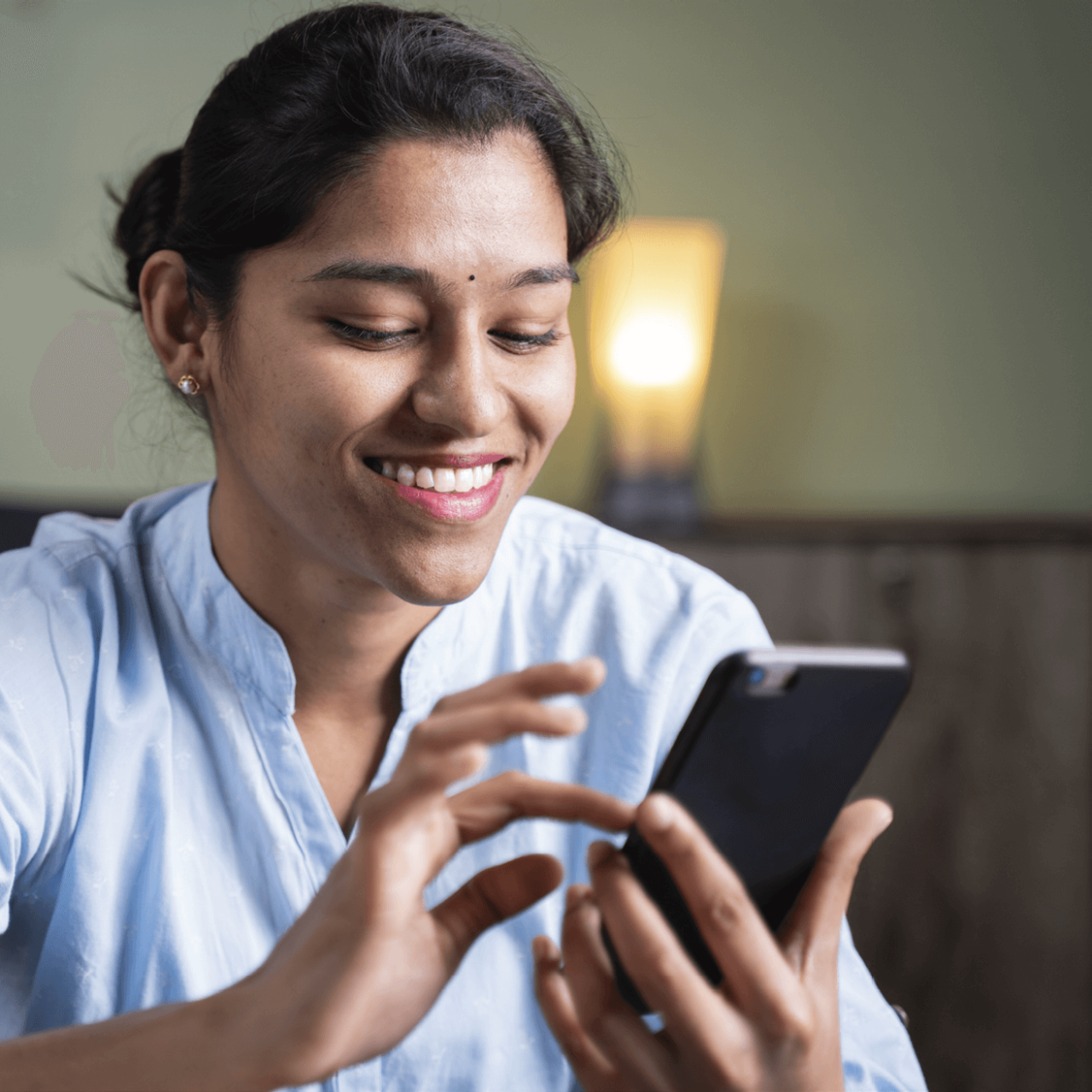 Smiling woman with phone for marketing mix