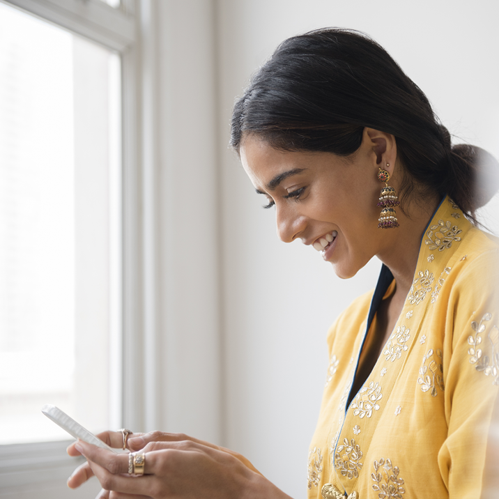 women looking at phone
