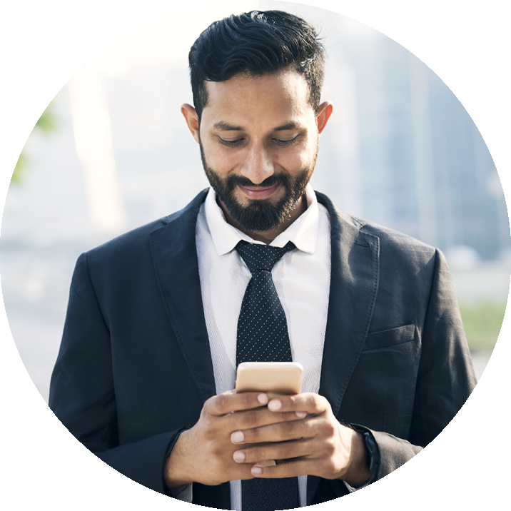 man laughing with phone